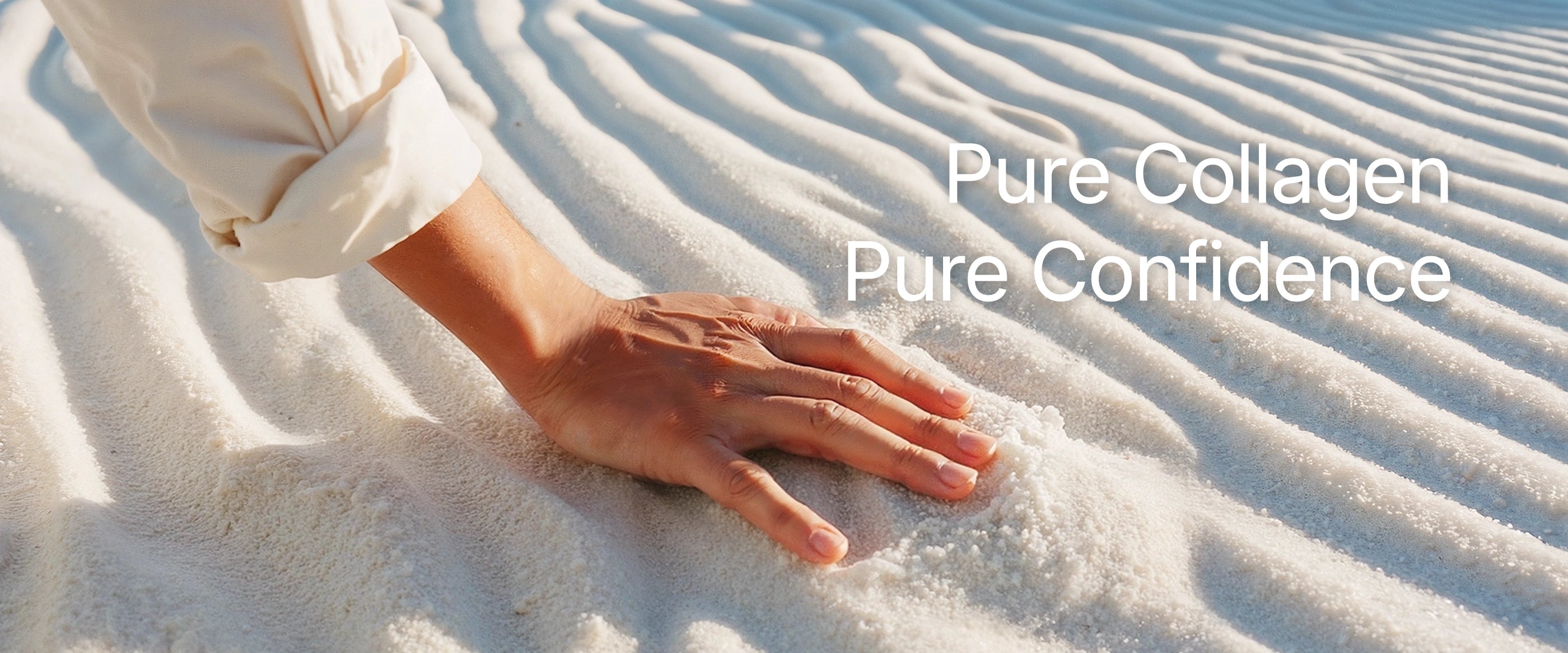 Close-up of a hand touching soft white sand with the text "Pure Collagen, Pure Confidence," symbolizing the purity and quality of CollaVita Collagen products.